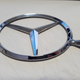 The perfect symbol for my S-class ownership experience: shiny, elegant, and ultimately worthless